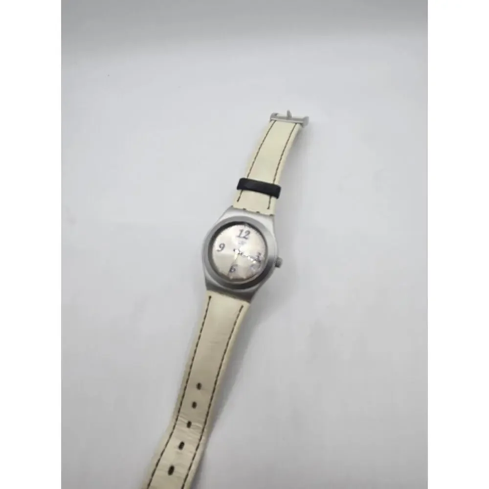 Swatch Women's Silver Case White Strap Watch with Blue Accents